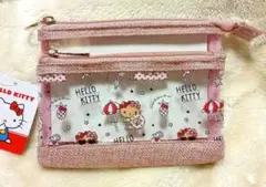 ハローキティ　日焼けキティ　クリアポーチ　総柄　ピンク　サンリオ　アベイル