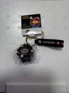 【新品未開封】ポムポムプリン 黒 ミャクミャク なりきり キーホルダー 万博