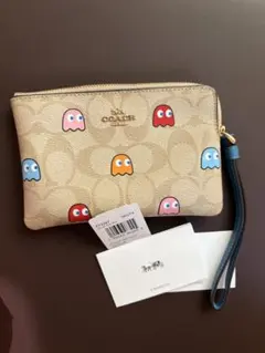 【未使用】COACH パックマン風ポーチ ベージュ系のサムネイル