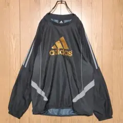 アディダス adidas プルオーバー ナイロンジャケット 黒/ゴールド Ｍ
