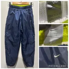 古着 NIKE ナイキ ナイロンパンツ トラックパンツ 紺 00sビンテージ