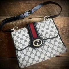 グッチ GGパールボタン黒コート シェリーライン - メルカリ