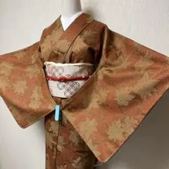 ウール着物　単衣　未使用ながら虫食いありの訳あり　ブラウン色系　植物柄