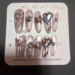 某Shopで購入したハンドメイドピンク系 ロングネイルチップ Sサイズ