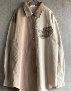 ベージュ 長袖シャツ プリントデザイン