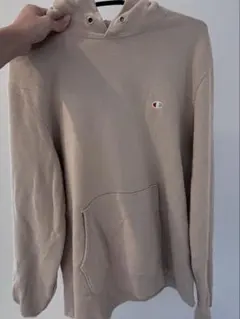 Champion ベージュ フード付きパーカー