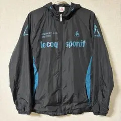 ルコックスポルティフ フード付きジャケット ブラック/ブルー