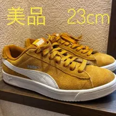 オレンジ スニーカー