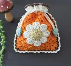 かぎ針編みポーチ　ハンドメイド　巾着ポーチ　花モチーフポーチ
