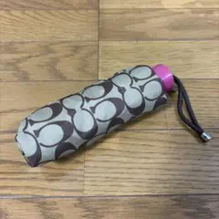 COACH 折りたたみ傘 シグネチャー柄 ピンクのサムネイル