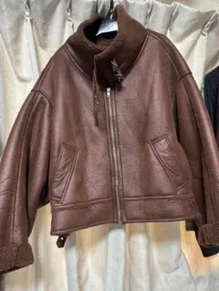 ジーナシス　ムートン風コート