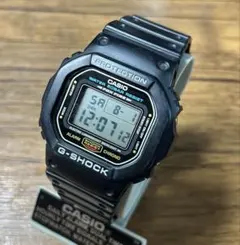 G-SHOCK DW-5600TMN-1JR 招き猫 ブラックアイパッチ 缶付 - メルカリ