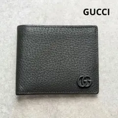 美品✨️グッチ 二つ折り財布 GGマーモント ロゴ刻印 レザー グレー 男女兼用のサムネイル