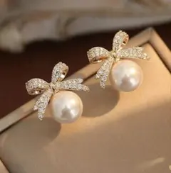 新品　リボン　パールピアス　ゴールド　パーティー　結婚式　インポート　お呼ばれ