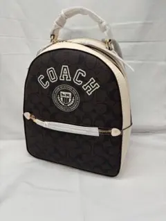 【COACH】新品未使用 コーチ バックパック 茶×白 シグネチャー CB871