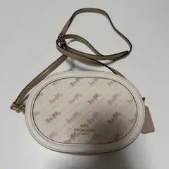 COACH オーバル　ショルダーバッグ ホワイト　馬車柄ロゴプリント　モノグラム