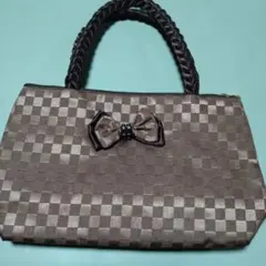 ナラヤ　ブラウンチェック柄リボン付きハンドバッグ