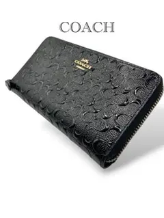 COACH シグネチャー型押しレザー ラウンドファスナー長財布 ブラック