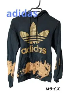 adidasオリジナルス 黒金 スプラッターパーカー