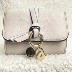 新品未使用】COACH 花柄 シグネチャー 長財布 リストレット 白ホワイト