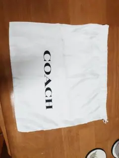 COACH ホワイト収納袋
