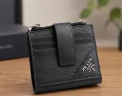 極美品　PRADA サフィアーノ 二つ折り財布　ブラック　確実正規品 極美品 PRADA サフィアーノ 二つ折り財布 ブラック 確実正規品 - メルカリ