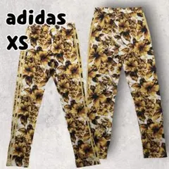 完売品adidas JEREMY SCOTT ハイビスカス柄トラックパンツ XSのサムネイル