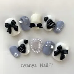 お色変更＆サイズ変更無料♪ ベリーショート　バレリーナリボンのキラキラネイル♡