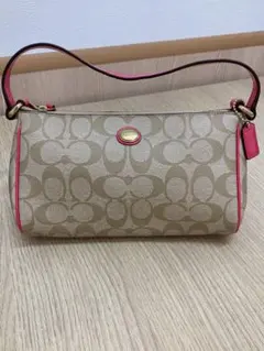 COACH シグネチャー ポーチ ベージュ ピンクのサムネイル