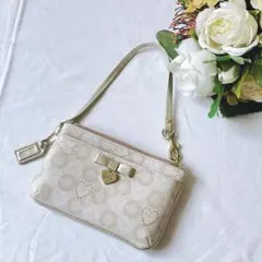 コーチ COACH リストレット ポーチ オプアート PVC ハート柄