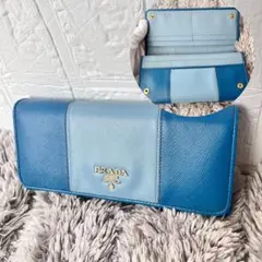 良品 PRADA サフィアーノ ブロッキングレザー ブルー 長財布 - メルカリ