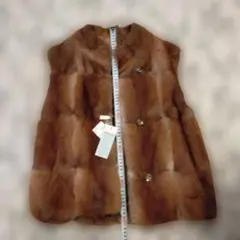 毛皮ベスト　新品未使用 ボタン付き