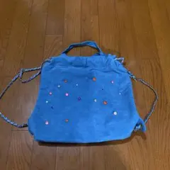 青いスエードリュック・ビーズ付き