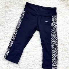 美品✨NIKE DRI-FIT ランニングタイツ カプリパンツ黒×白 総柄 Sのサムネイル