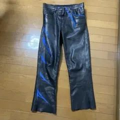 黒 ブーツカットレザーパンツ グラフィックプリント - メルカリ