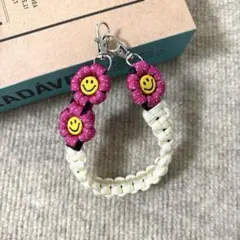 パラコード　ハンドスマホストラップ　☺︎ニコちゃん☺︎ お花　ハンドメイド
