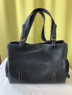 キタムラの皮革トートバッグ Kのロゴ付き