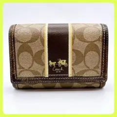 コーチ COACH 馬車柄 ヘリテージ PVC 2つ折り財布 L字ファスナー