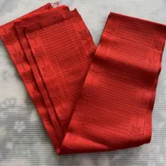 朱色に近い赤のストライプと花の地模様 半幅帯