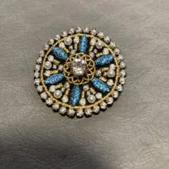 青と金の花模様ブローチ