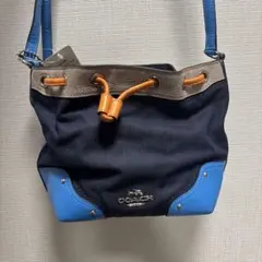 【新品】COACH コーチ 巾着ショルダーバッグ デニムレザー