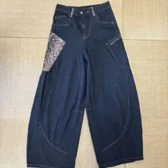 スネークスキンパッチ付きデニムパンツ