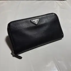 PRADA プラダ　長財布　サフィアーノ　三角プレート 小銭入れに破れあり