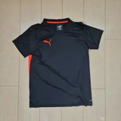 PUMA 半袖シャツ ブラック/オレンジ 160