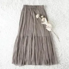 TIARA　ティアラ　ランダムプリーツシアーティアードロングスカート　モカ