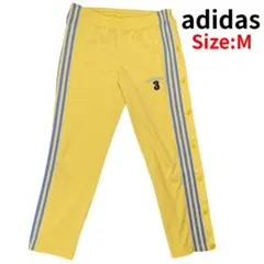 アディダス サイドスナップボタン トラックパンツ ジャージ 3本ライン ゴールド adidas - アディダス 3本ライン ジャージ パンツ 黒金