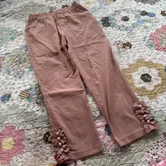美品　&LOVE アンドラブ パール リボン ストレッチパンツのサムネイル