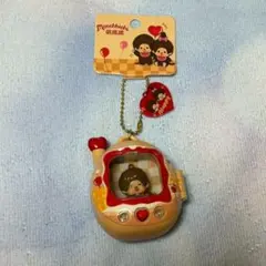 新品タグ付き　モンチッチたまごっちマスコット黄色キーホルダー