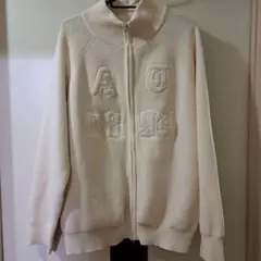 アイボリーの刺繍ジップアップセーター M