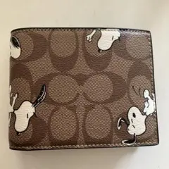 COACH x PEANUTS 二つ折り財布 スヌーピーのサムネイル